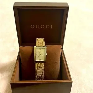 Gucci | Accessories | Gucci Gg Brown Canvas Watch | Poshmark display picture 1